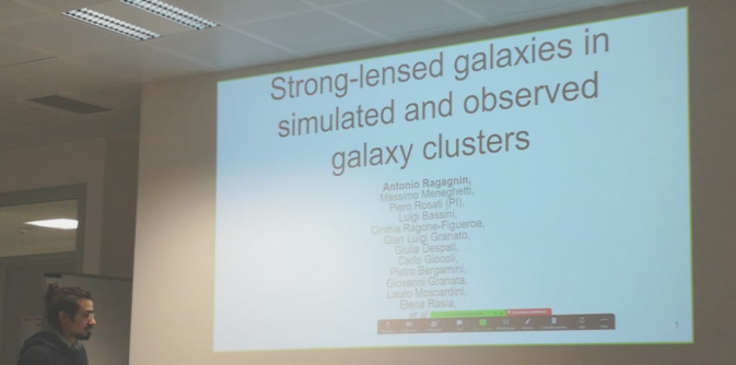 Antonio Ragagnin presenting galaxy galaxy strong lensing galaxy cluster talk